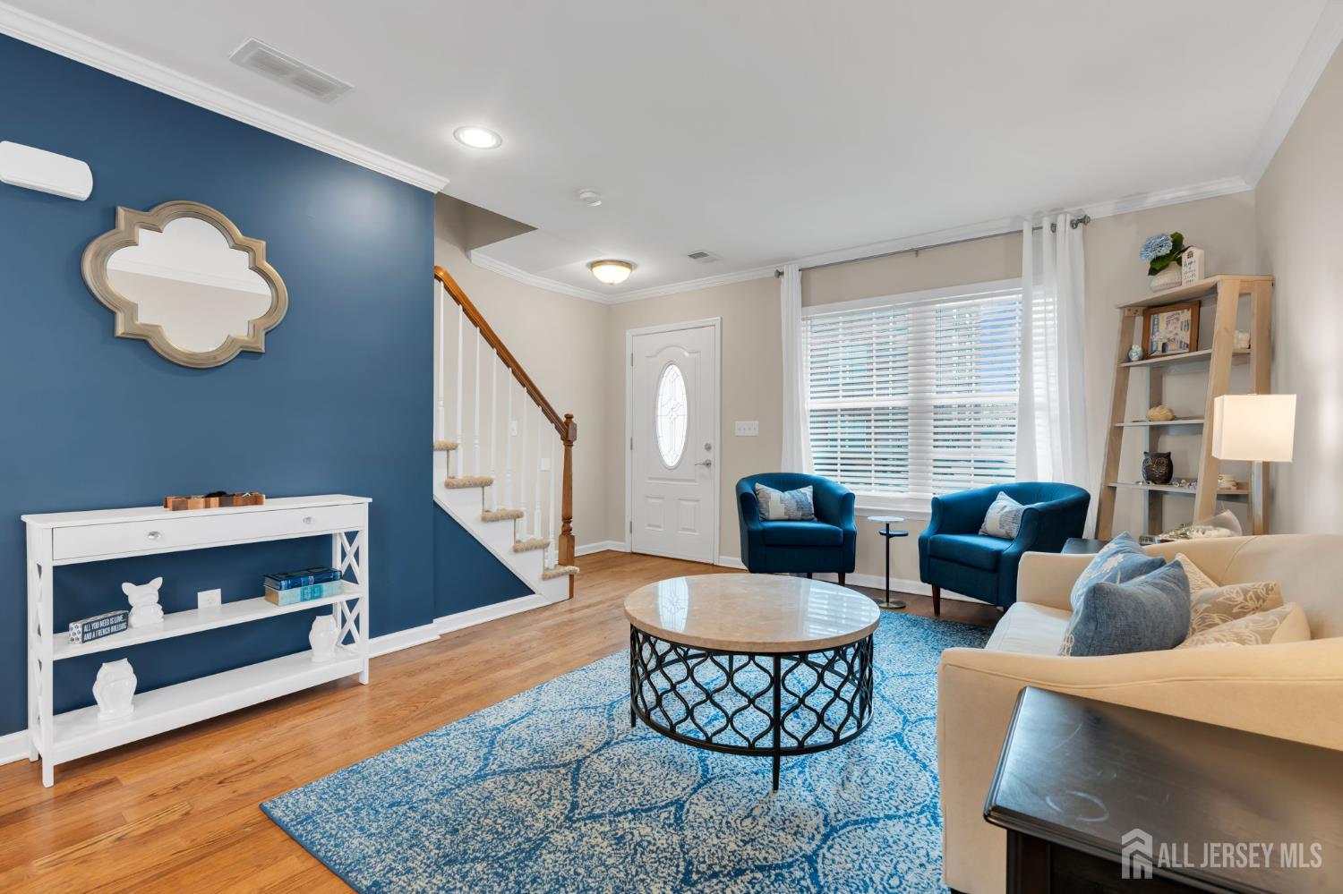 3 Harrison Avenue Aberdeen, NJ 07747 - Photo 5 of 46 a living room with furniture and a rug