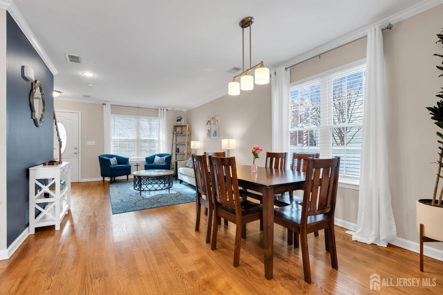 3 Harrison Avenue Aberdeen, NJ 07747 - Photo 10 of 46 a view of a dining room with furniture window and wooden floor