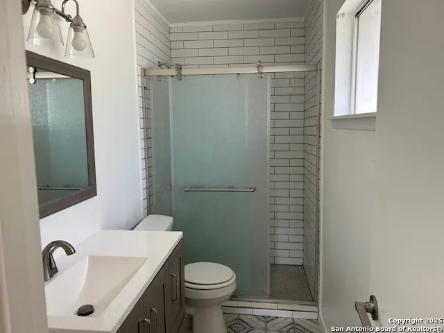 a bathroom with a sink and a toilet