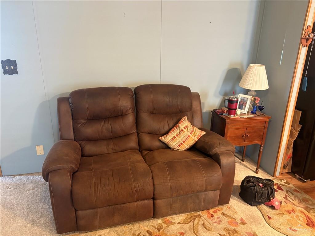 310 Randal Drive, Unit H12 Mission, TX 78572 - Photo 13 of 36 a living room with furniture