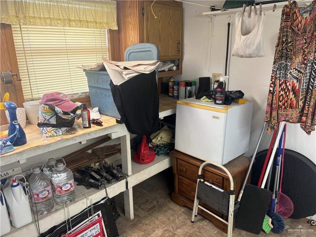 310 Randal Drive, Unit H12 Mission, TX 78572 - Photo 24 of 36 a room with storage and utility