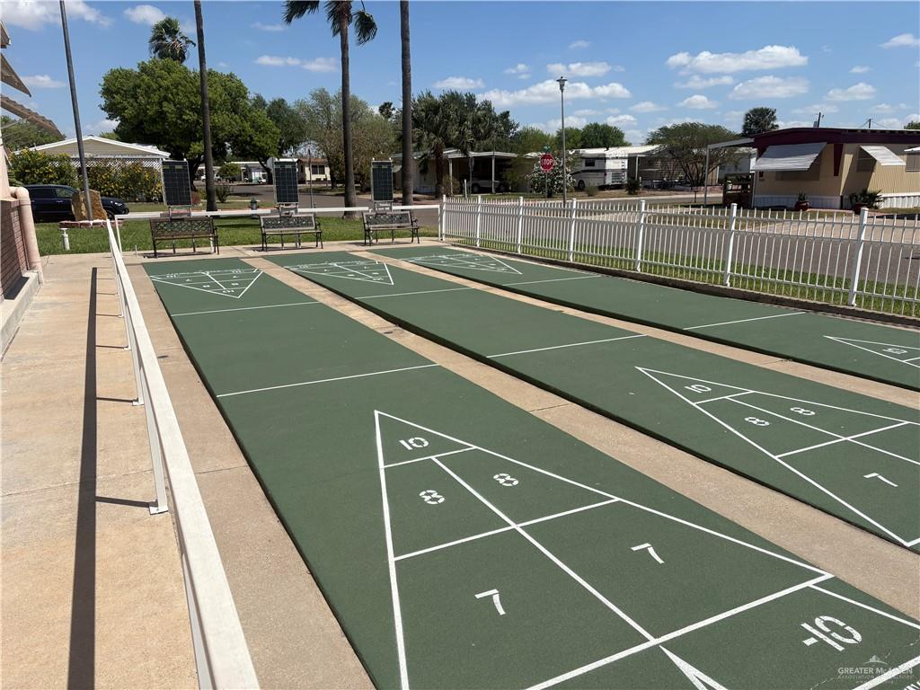 310 Randal Drive, Unit H12 Mission, TX 78572 - Photo 34 of 36 a view of a tennis court