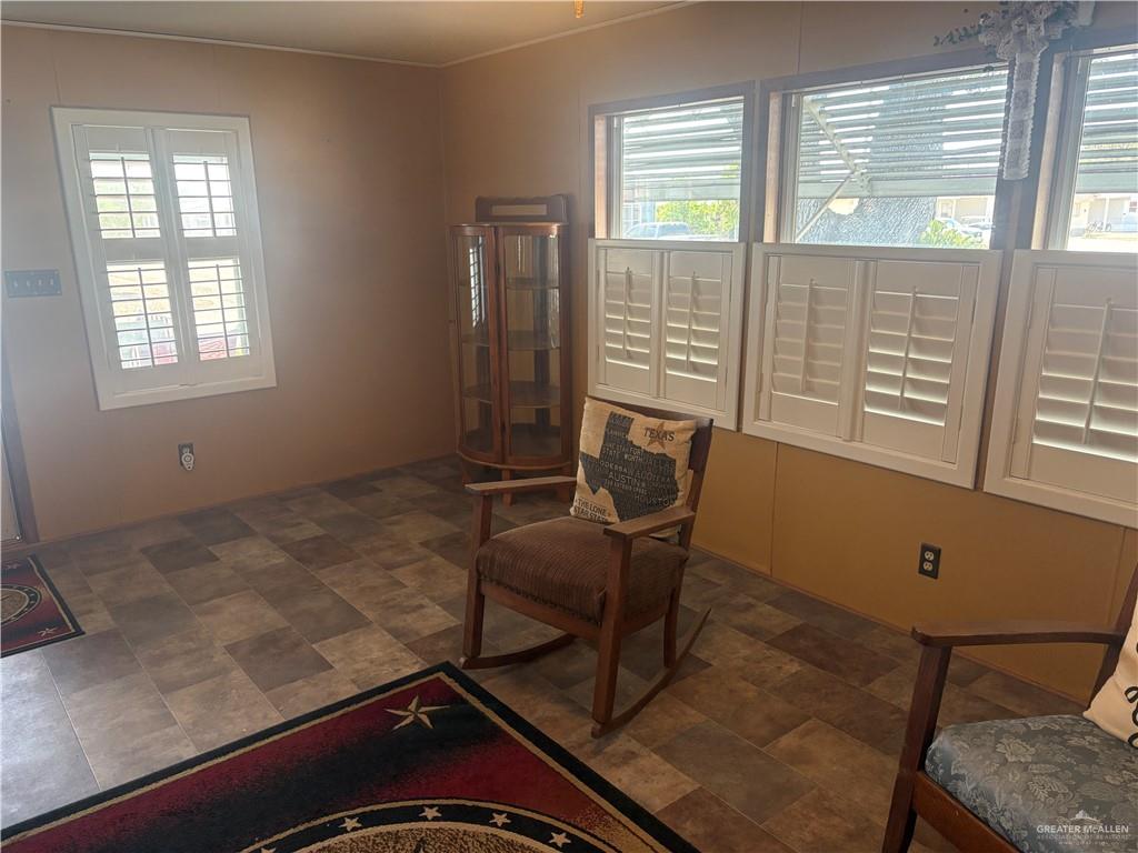 310 Randal Drive, Unit H12 Mission, TX 78572 - Photo 6 of 36 a room with furniture and windows