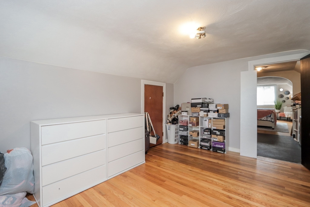 143 Redlands Street Springfield, MA 01104 - Photo 24 of 38 a view of a room with wooden floor and closet