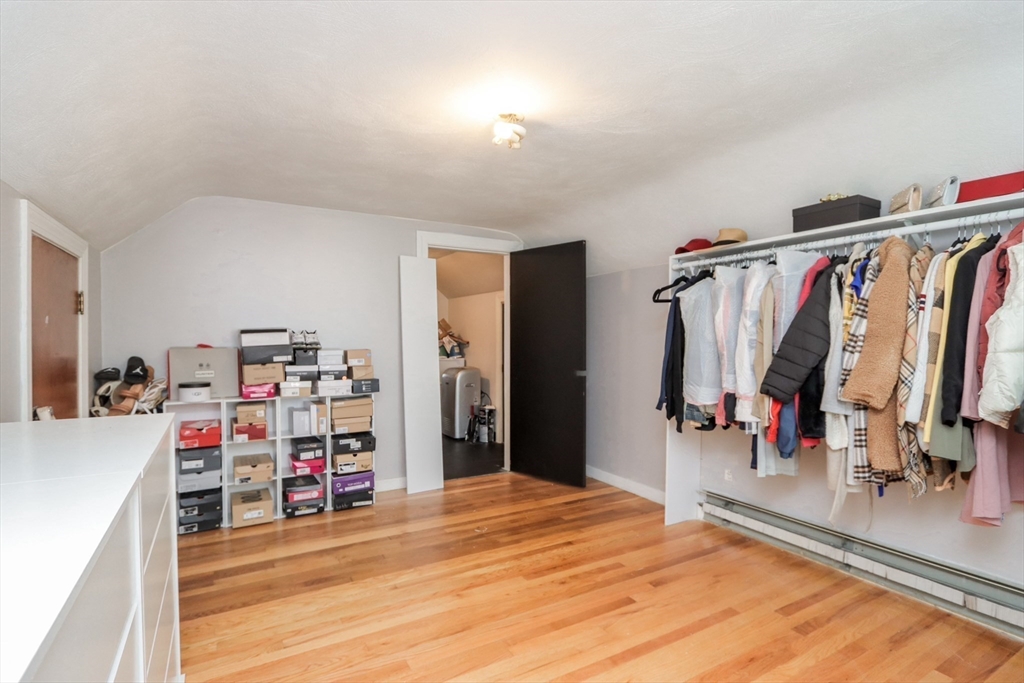 143 Redlands Street Springfield, MA 01104 - Photo 31 of 38 a view of a room with clothes and shoes