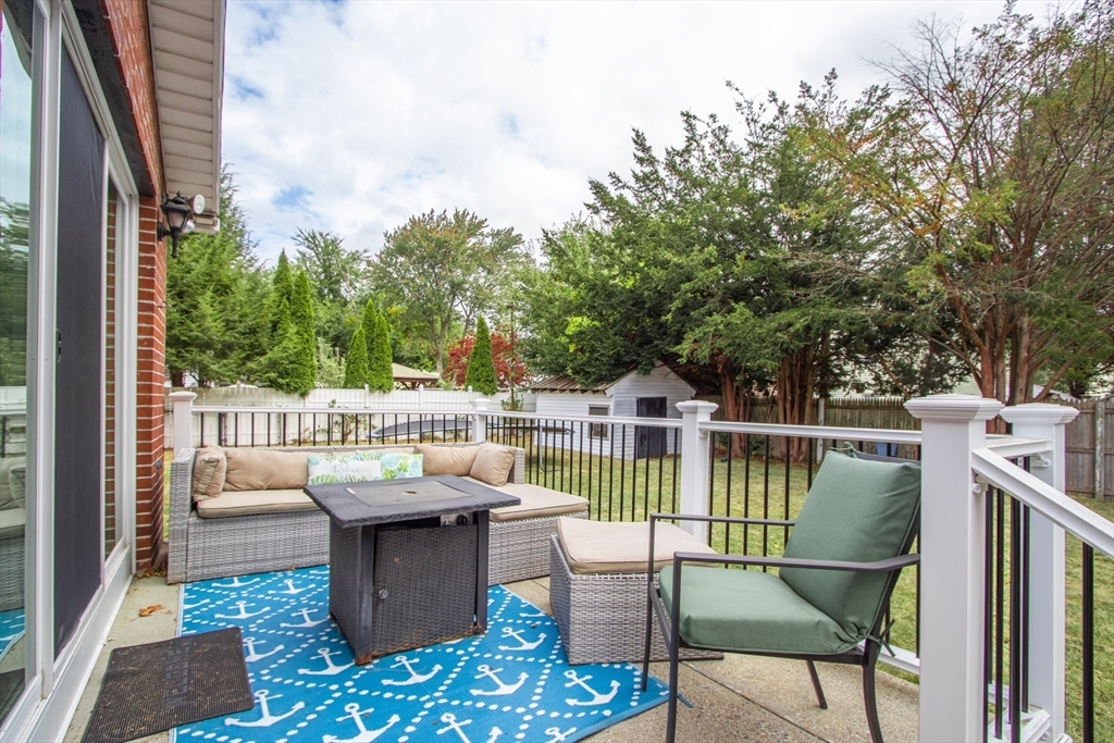143 Redlands Street Springfield, MA 01104 - Photo 10 of 38 a balcony with chairs