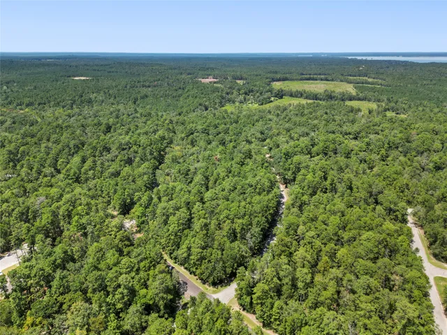 a view of a field with an outdoor space