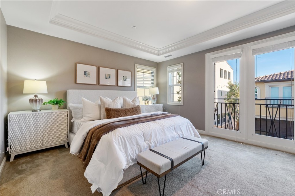 215 Bryce Run Lake Forest, CA 92630 - Photo 15 of 33 a spacious bedroom with a bed and furniture