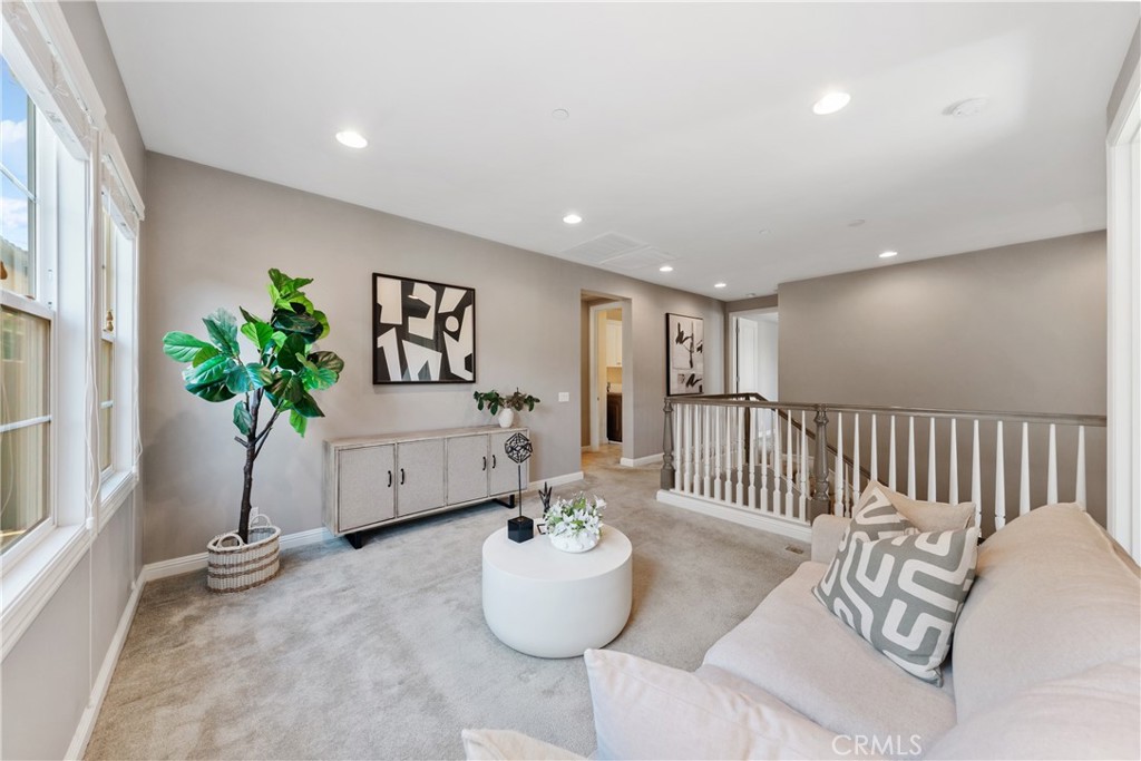 215 Bryce Run Lake Forest, CA 92630 - Photo 20 of 33 a living room with furniture and a potted plant