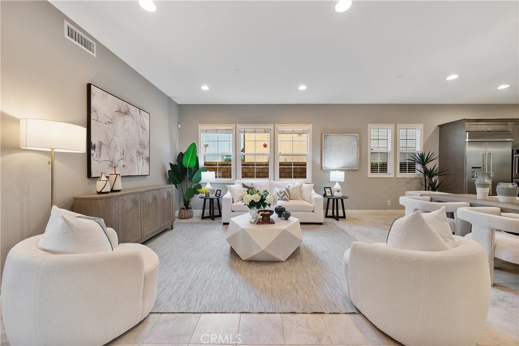 215 Bryce Run Lake Forest, CA 92630 - Photo 2 of 33 a living room with furniture and a large window