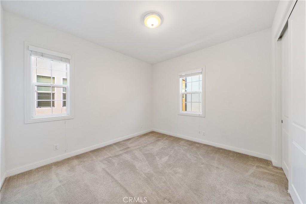 215 Bryce Run Lake Forest, CA 92630 - Photo 23 of 33 an empty room with windows