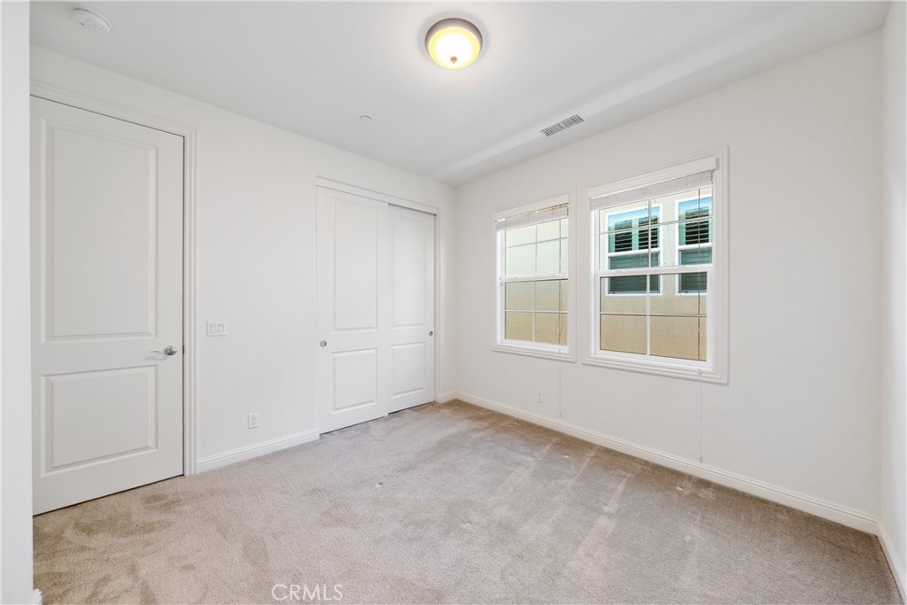 215 Bryce Run Lake Forest, CA 92630 - Photo 24 of 33 an empty room with windows