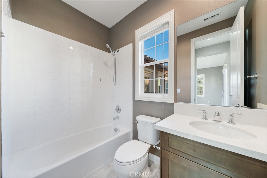 215 Bryce Run Lake Forest, CA 92630 - Photo 27 of 33 a bathroom with a sink toilet and shower