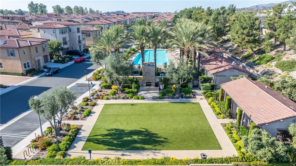 215 Bryce Run Lake Forest, CA 92630 - Photo 32 of 33 a view of a swimming pool with a garden
