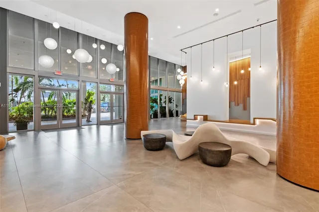 a bathroom with a tub and shower