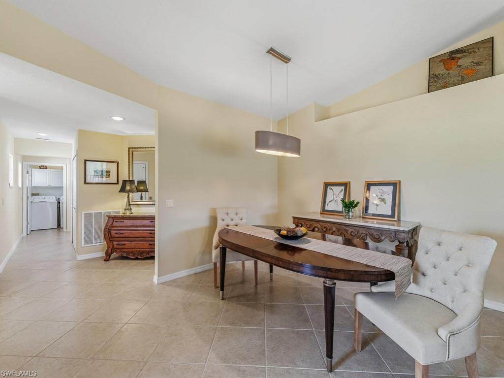 6095 Pinnacle Lane, Unit 1304 Naples, FL 34110 - Photo 10 of 47 a view of a livingroom with furniture and a couch