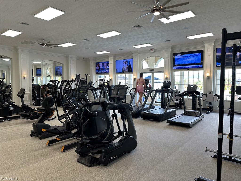 6095 Pinnacle Lane, Unit 1304 Naples, FL 34110 - Photo 44 of 47 a view of a room with gym equipment