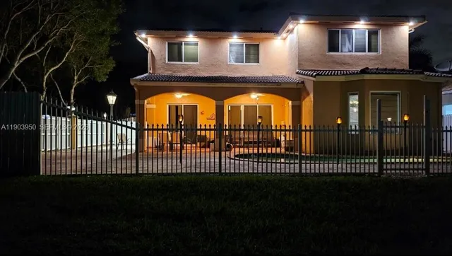 a view of a house with a tv
