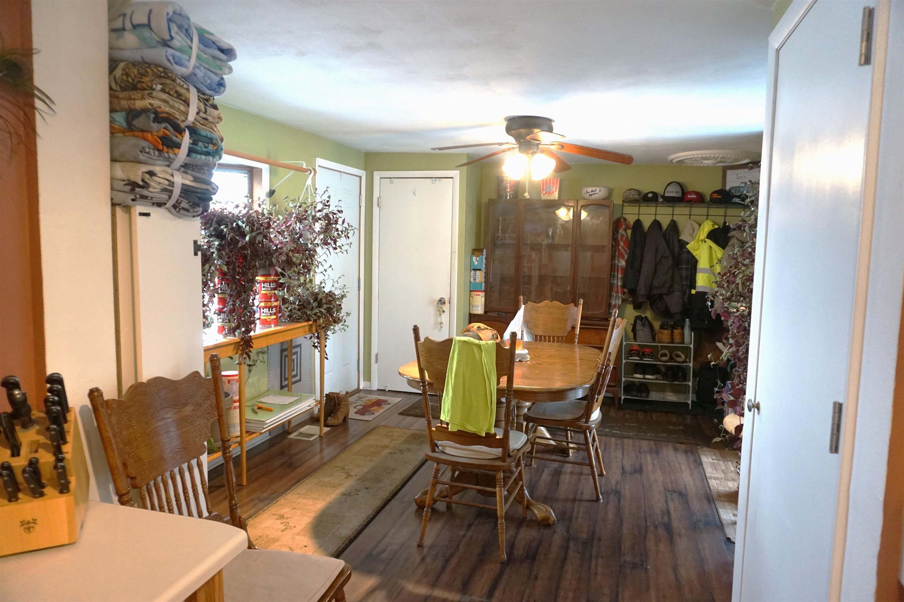 7402 Randy Road Machesney Park, IL 61115 - Photo 10 of 23 a view of a livingroom with furniture window and wooden floor