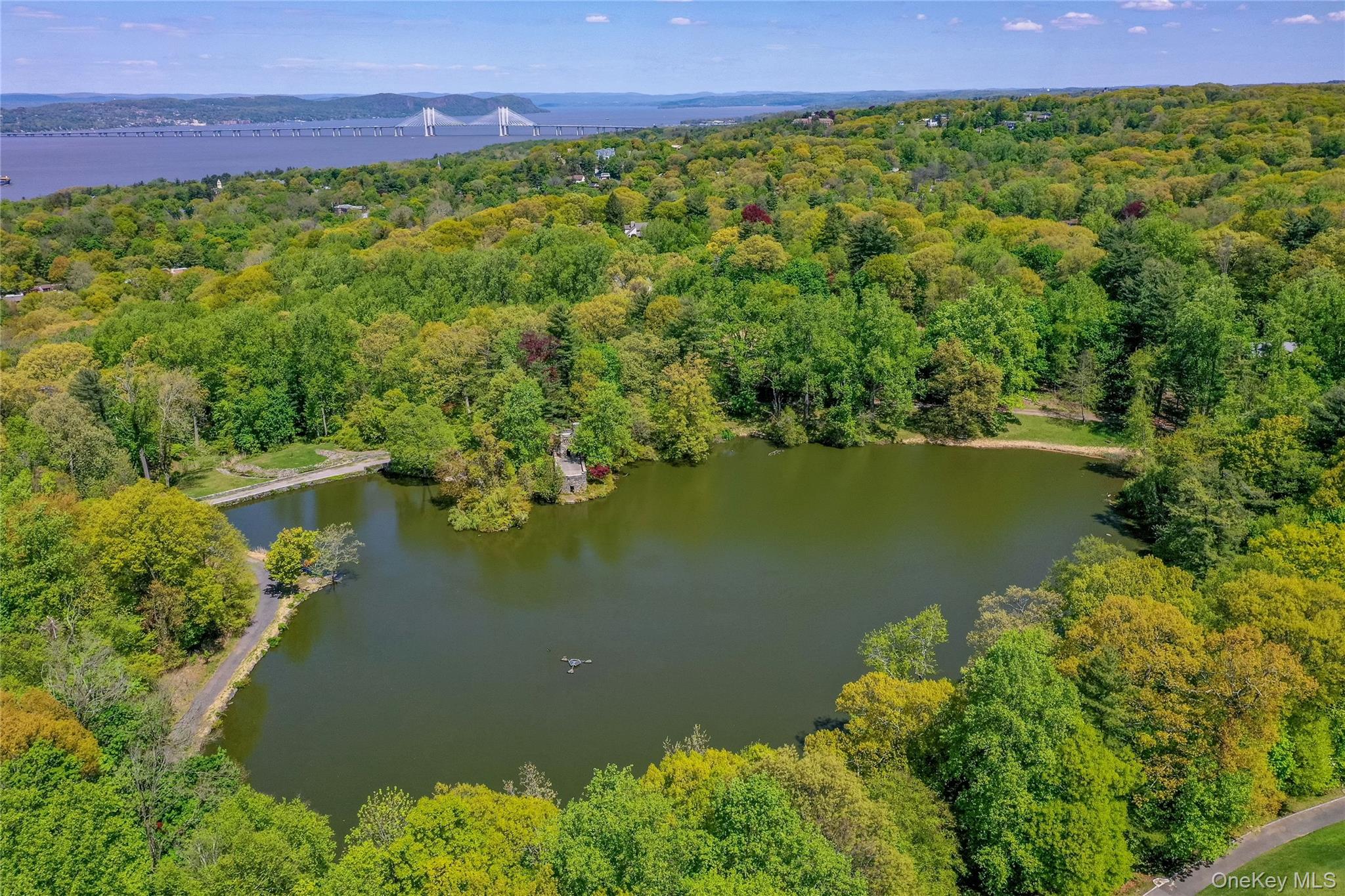 Lot #1 Castle Road Irvington, NY 10533 - Photo 1 of 26 a view of a lake with a yard