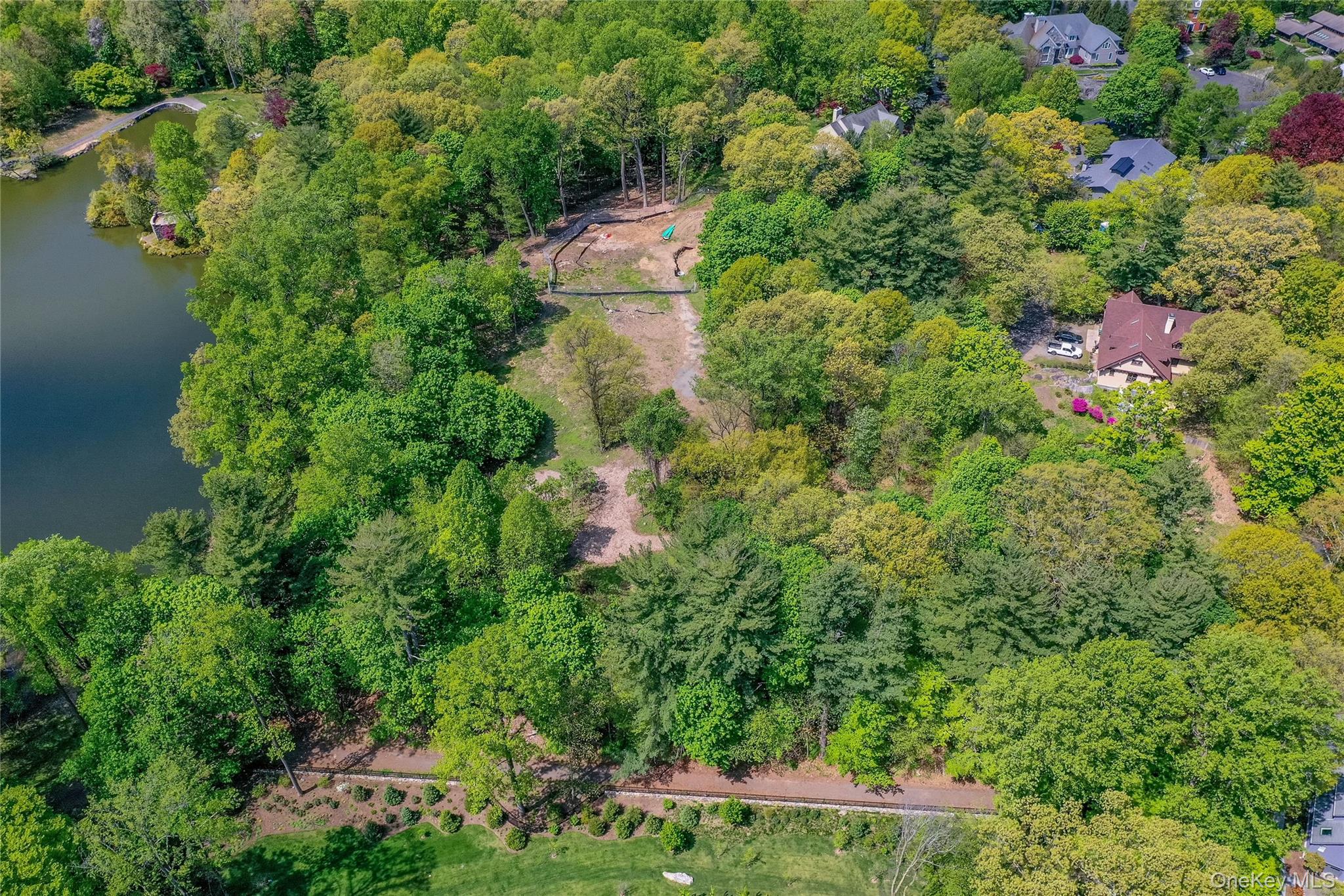 Lot #1 Castle Road Irvington, NY 10533 - Photo 11 of 26 an aerial view of residential house with outdoor space and trees all around
