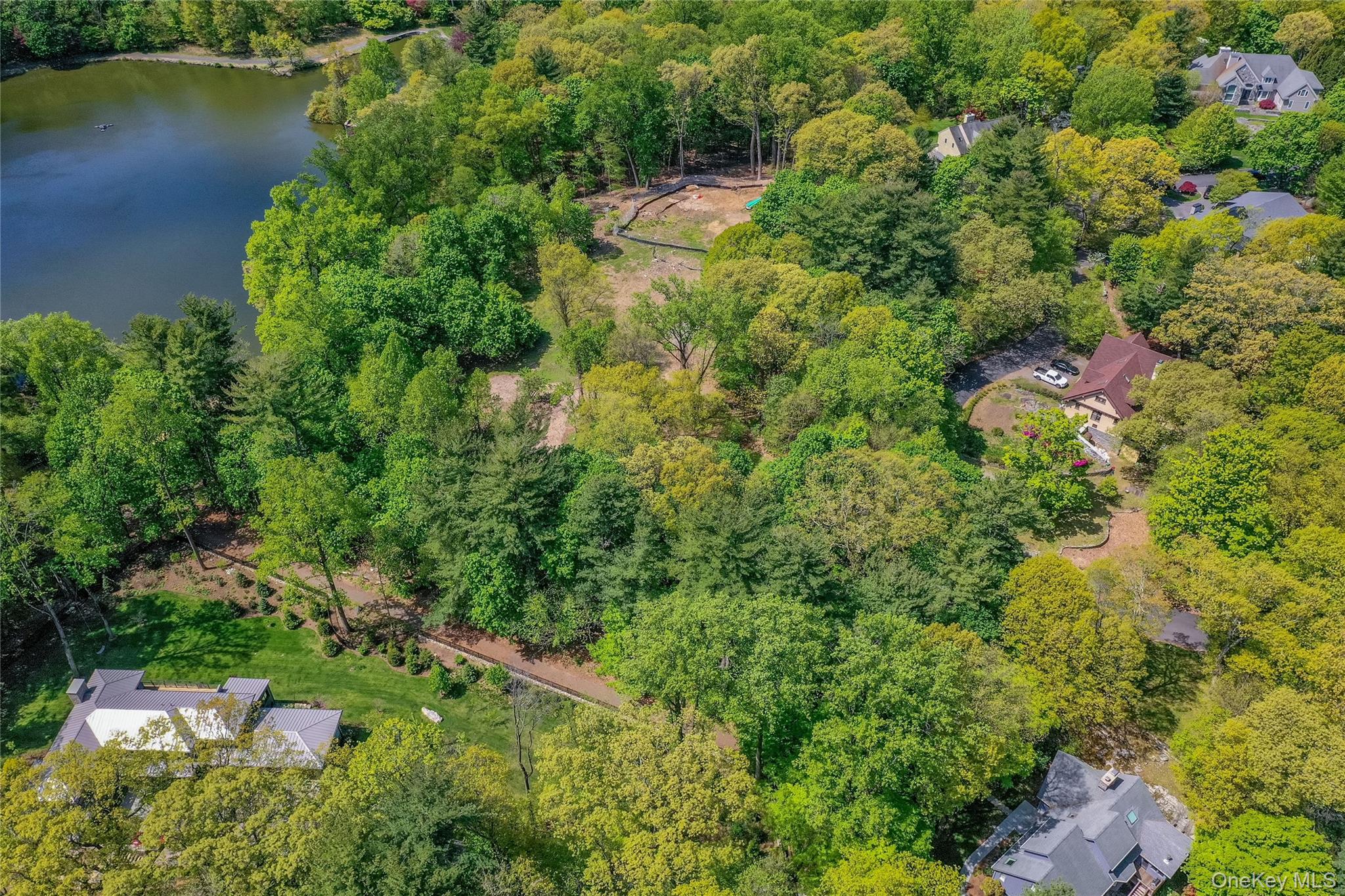 Lot #1 Castle Road Irvington, NY 10533 - Photo 15 of 26 an aerial view of residential house with outdoor space and trees all around