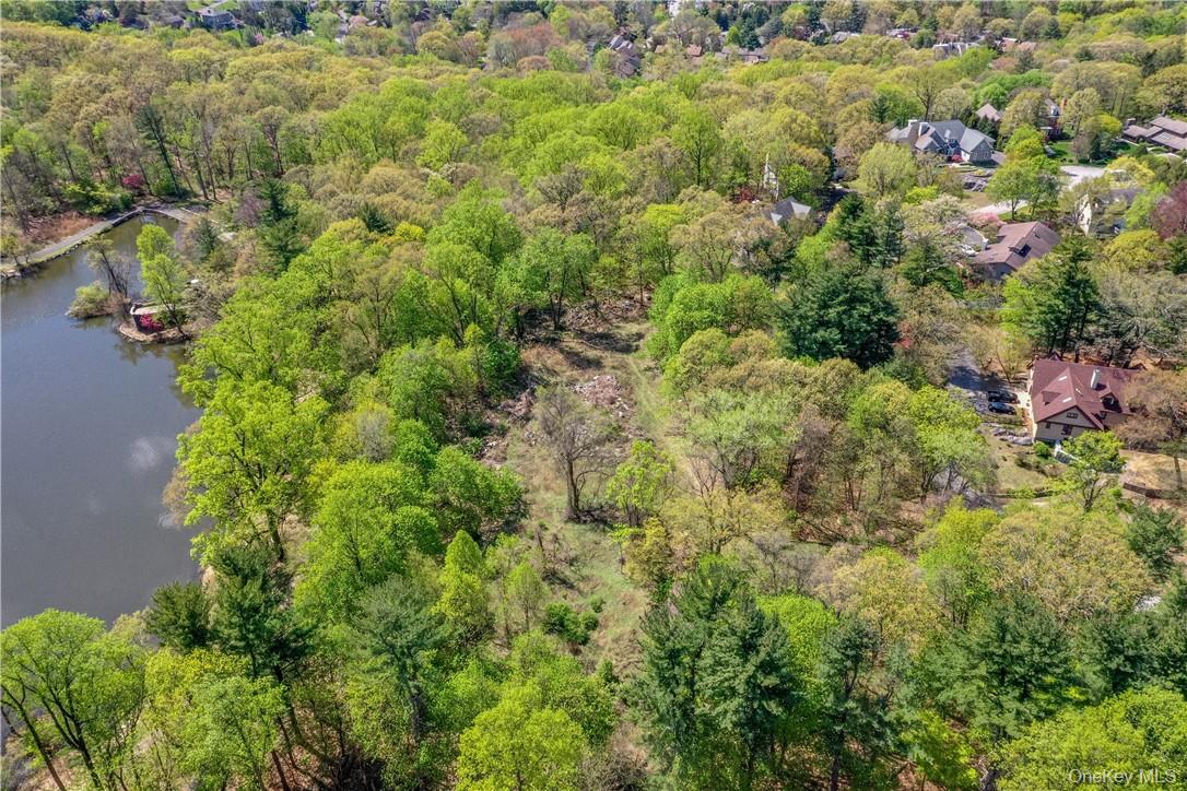 Lot #1 Castle Road Irvington, NY 10533 - Photo 4 of 26 an aerial view of residential houses with outdoor space and trees