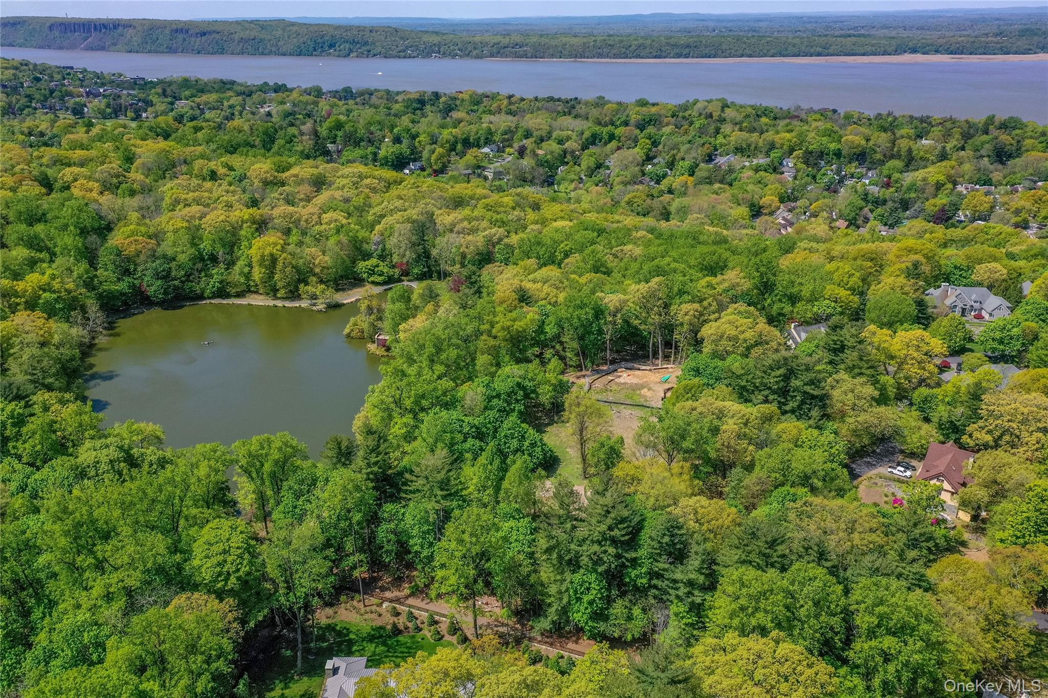 Lot #1 Castle Road Irvington, NY 10533 - Photo 10 of 26 a view of a garden with a lake