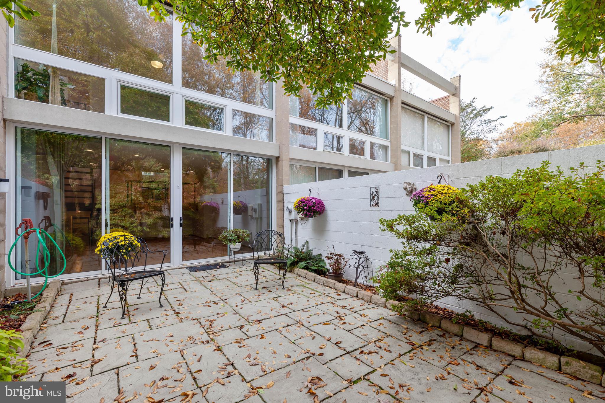 11520 Hickory Cluster Reston, VA 20190 - Photo 3 of 34 Home built into top of hill overlooking Woods