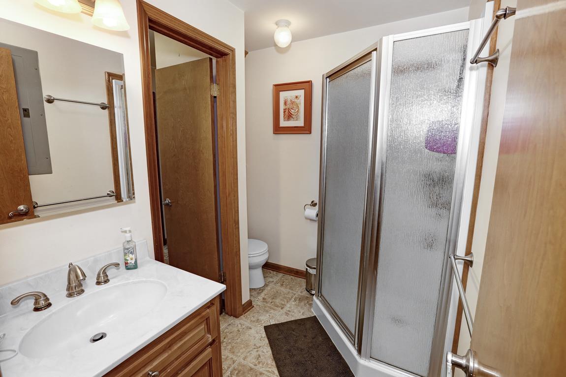 23164 Black Road Athens, AL 35613 - Photo 14 of 26 a bathroom with a sink and a mirror