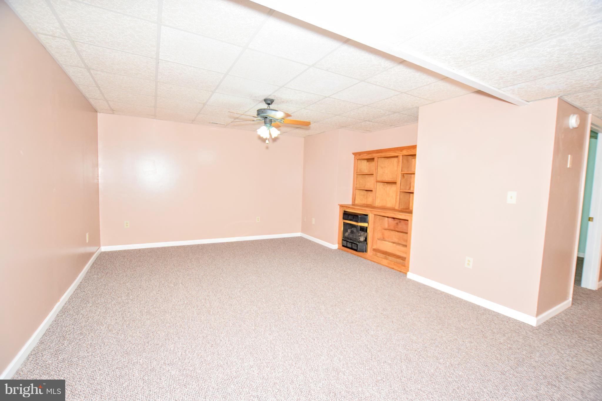 2521 Urey Road White Hall, MD 21161 - Photo 22 of 29 2nd Family Room w/ Fireplace in Lower Level