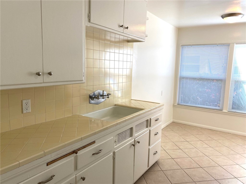 236 La Verne Avenue Long Beach, CA 90803 - Photo 4 of 8 a view of kitchen with furniture and window