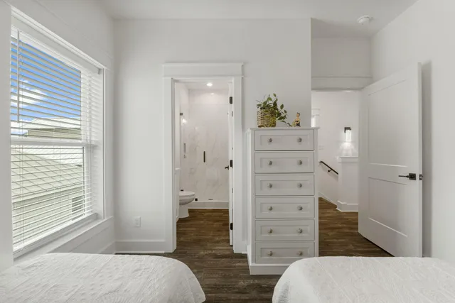 a bedroom with a bed and furniture