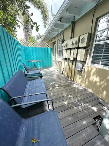 a view of a backyard with a patio