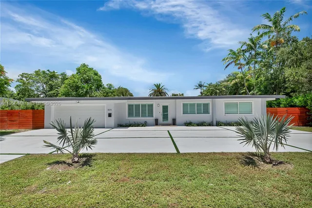 a view of a backyard with a garden