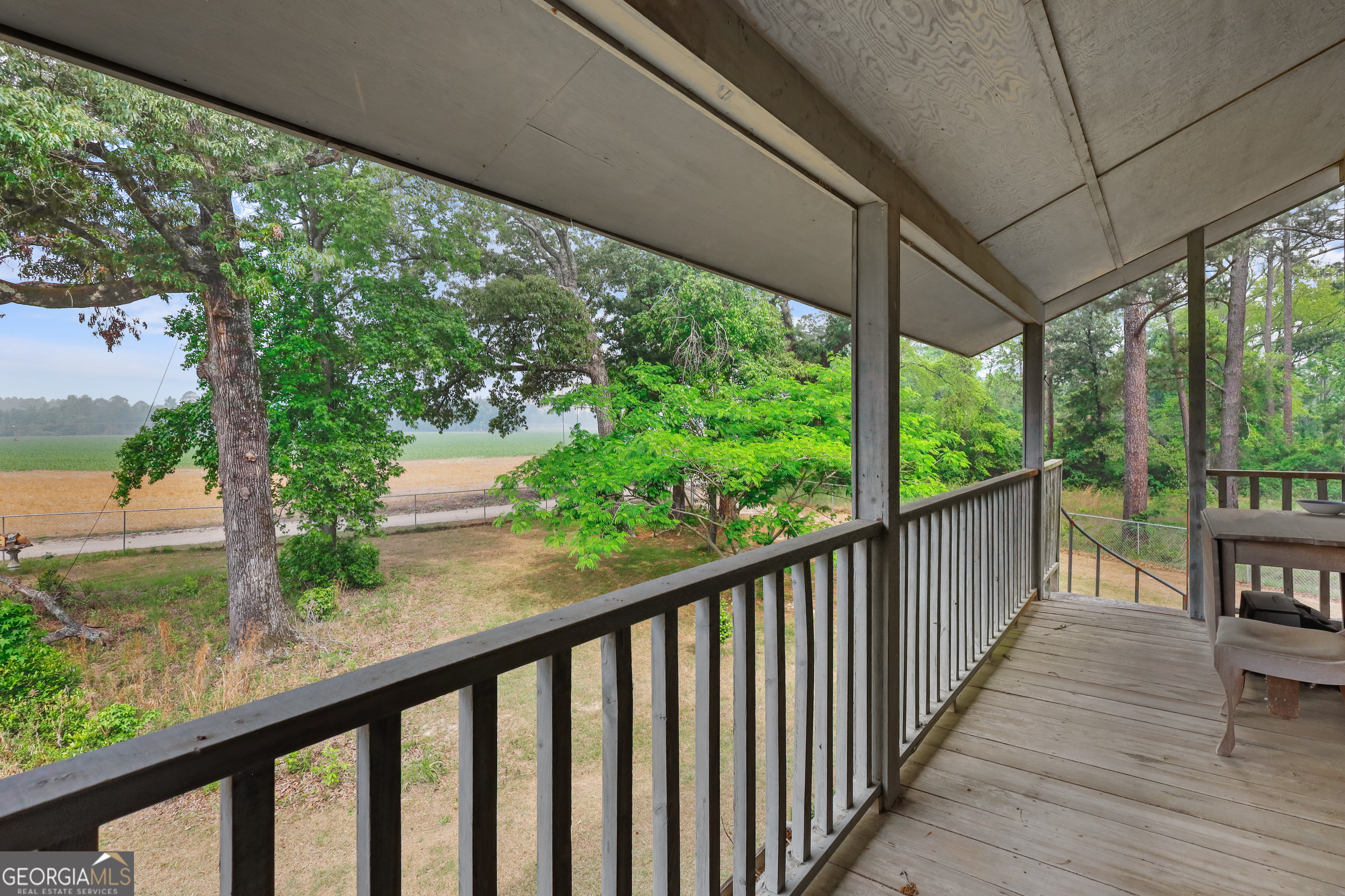 565 Bragg Road Brooklet, GA 30415 - Photo 27 of 44 a view of a porch with wooden floor and outdoor space