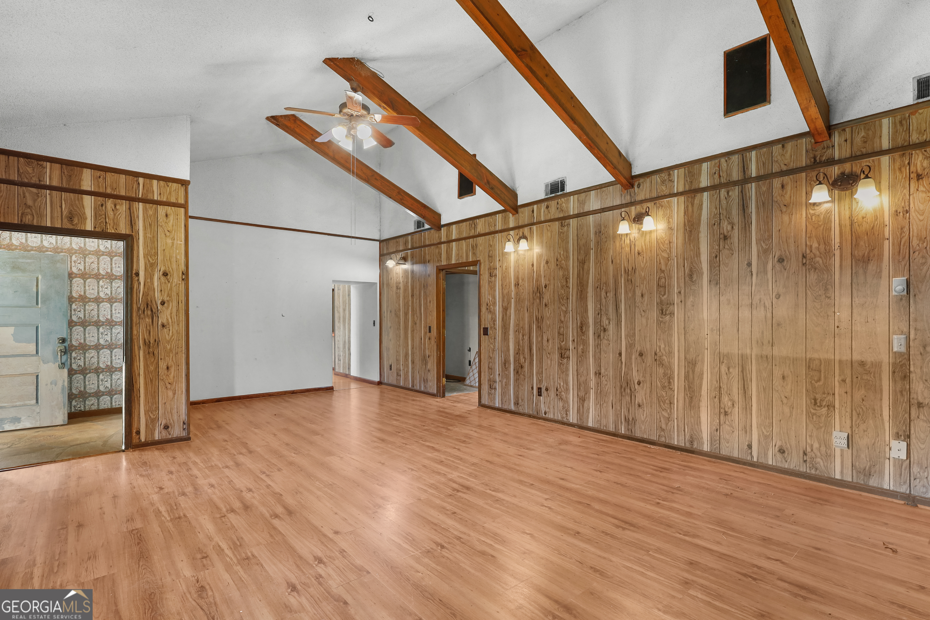 565 Bragg Road Brooklet, GA 30415 - Photo 8 of 44 a view of an empty room with wooden floor