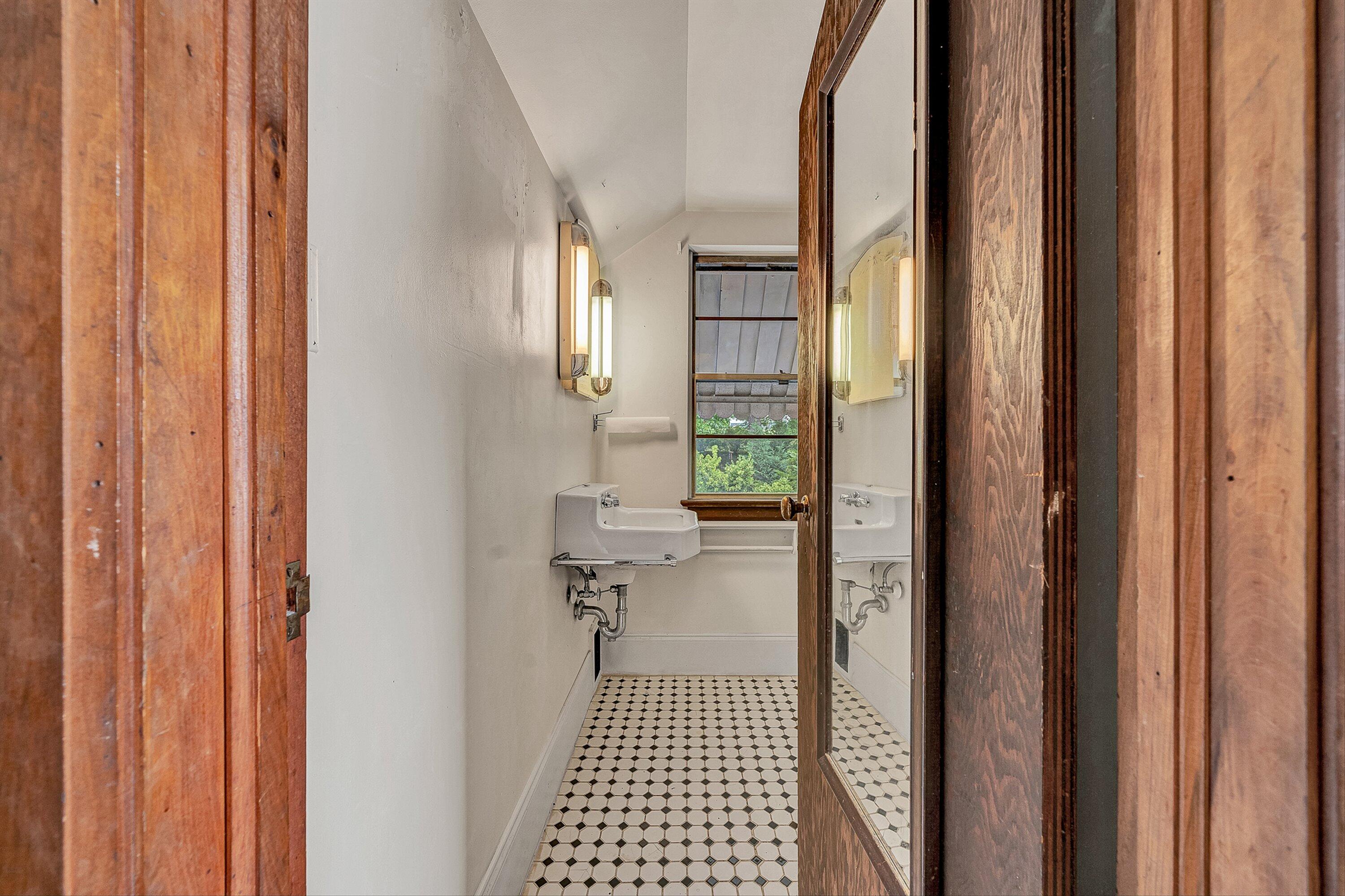 1917 Langdon Road Southwest Roanoke, VA 24015 - Photo 26 of 42 a bathroom with a sink and a shower