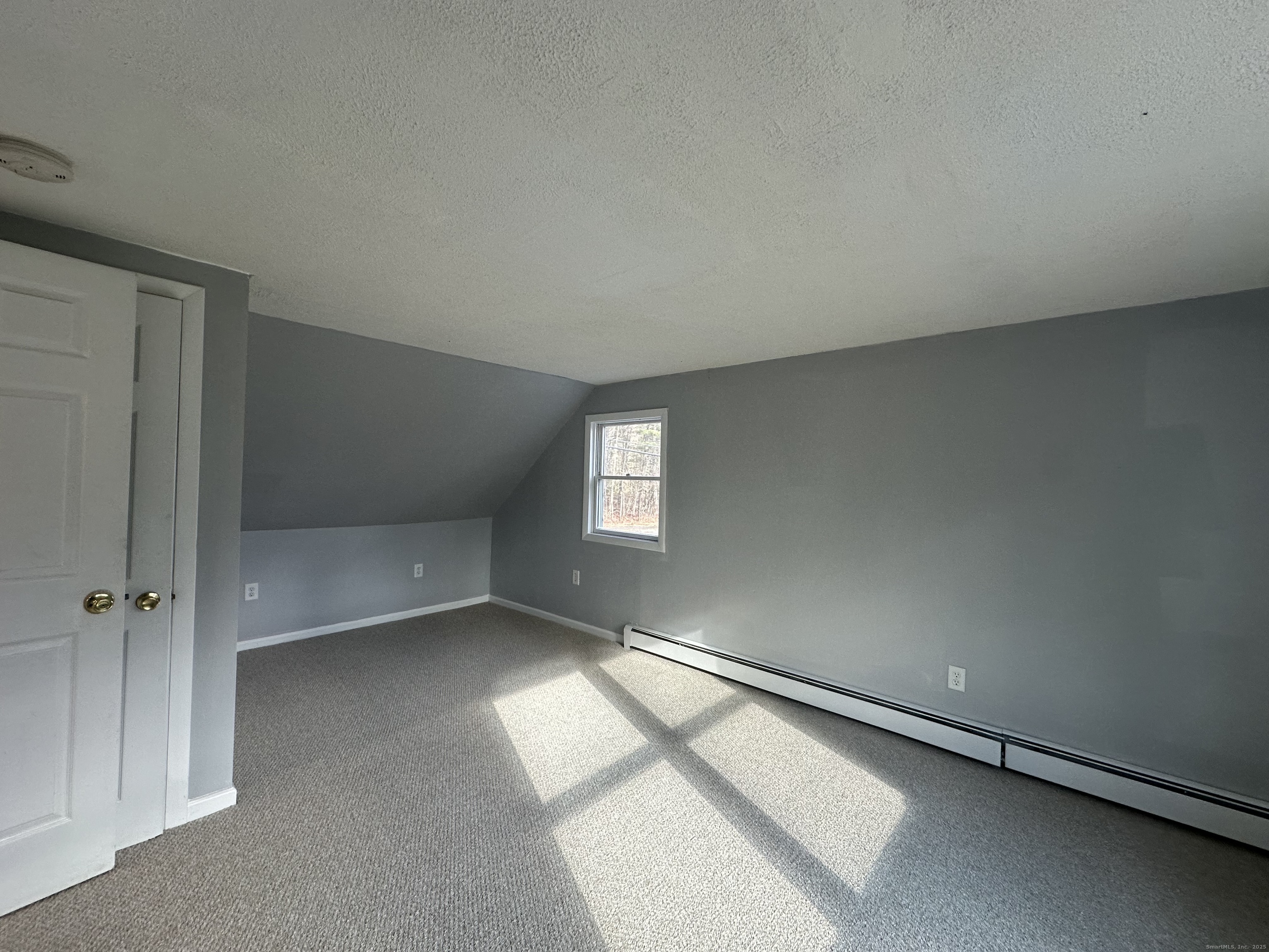 87 Scoville Road Avon, CT 06001 - Photo 13 of 16 an empty room with windows