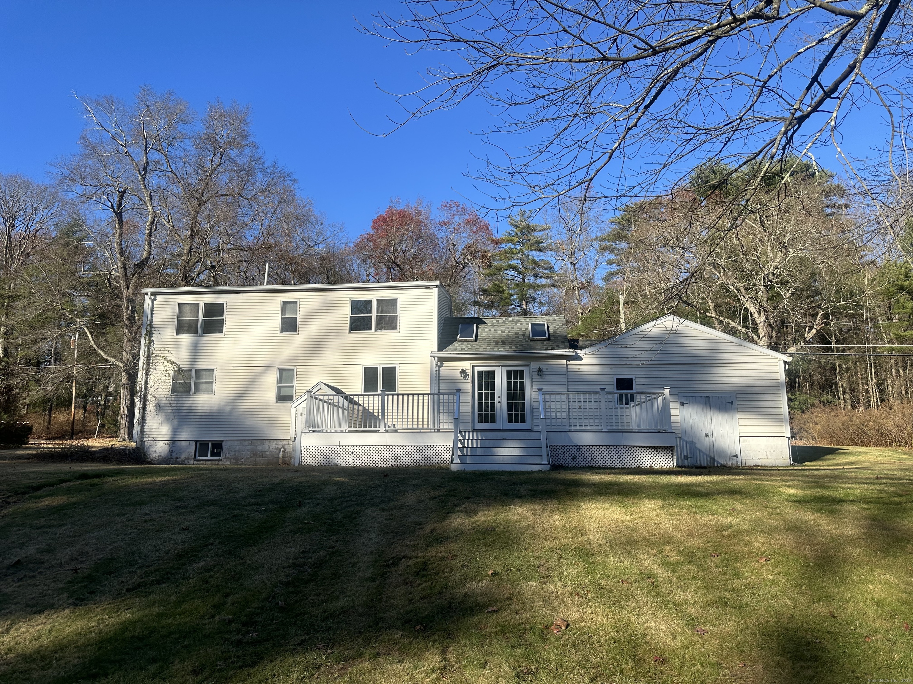87 Scoville Road Avon, CT 06001 - Photo 2 of 16 a view of a house with a yard