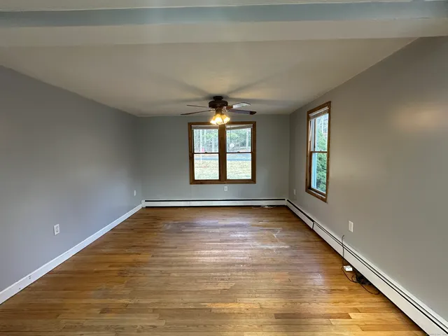 a view of an empty room and window