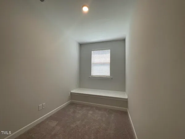 a bathroom with a toilet