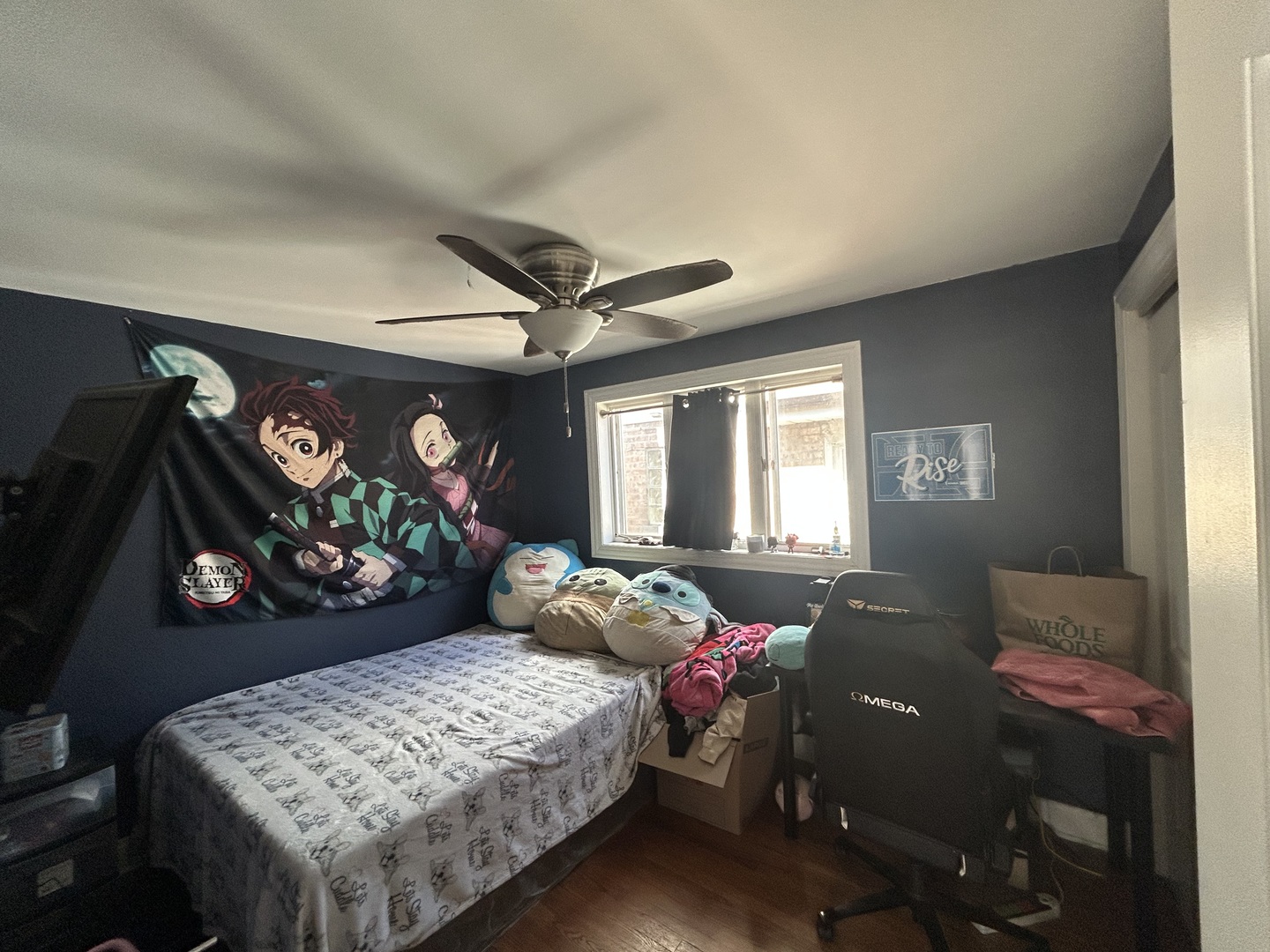 5810 South Austin Avenue Chicago, IL 60638 - Photo 5 of 11 a bedroom with a bed dresser and a window