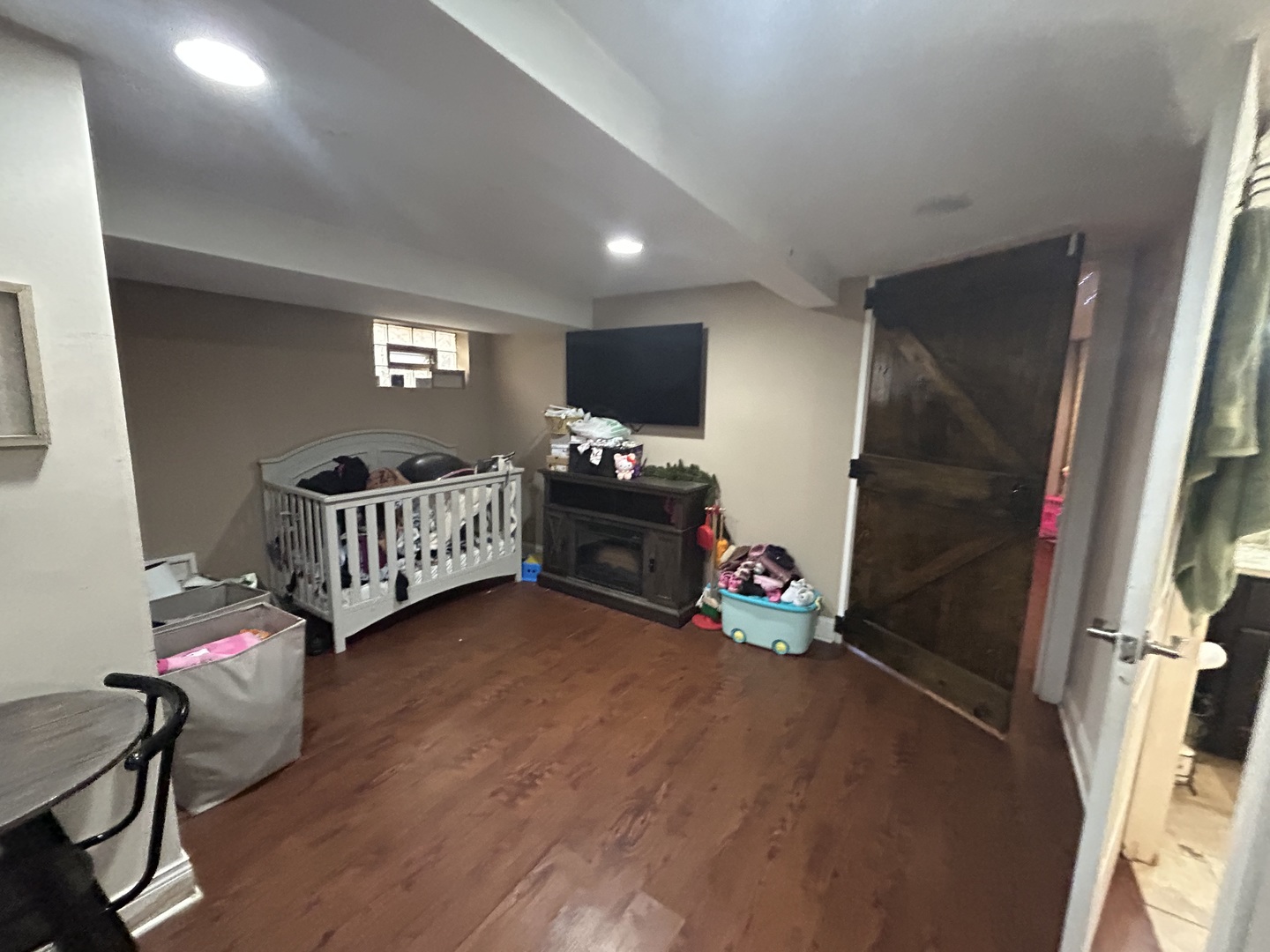 5810 South Austin Avenue Chicago, IL 60638 - Photo 9 of 11 a living room with furniture and a flat screen tv
