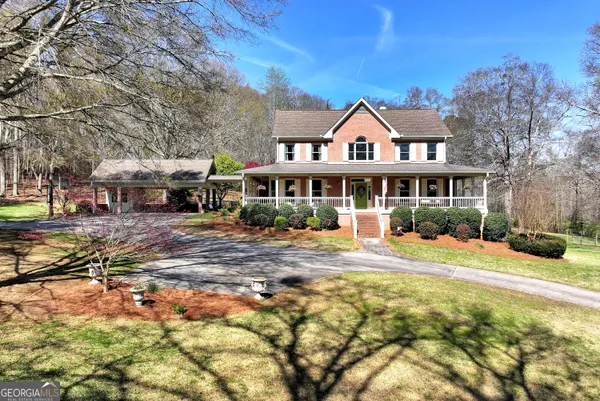 a view of a house with swimming pool