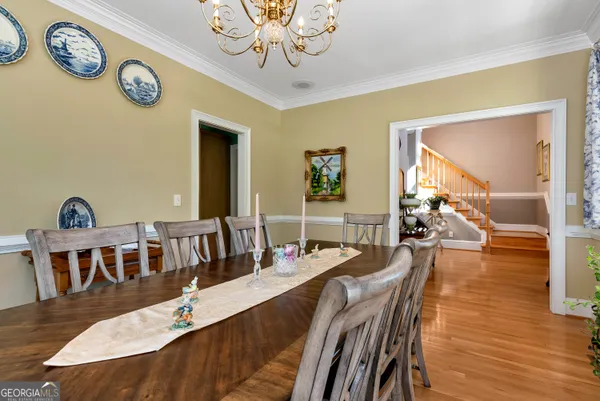a bathroom with a shower curtain and a window