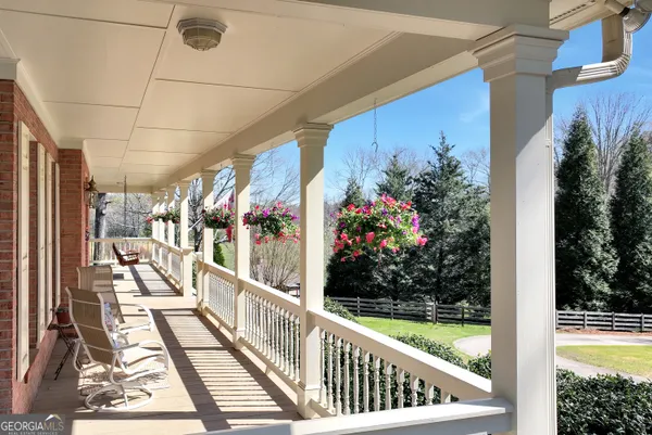 a view of outdoor space with trees in the background