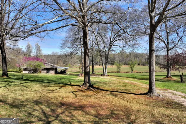 a view of a swimming pool with an outdoor space