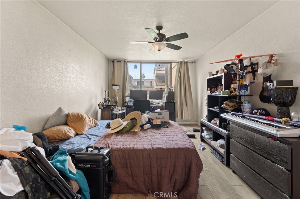 6979 Palm Court Riverside, CA 92506 - Photo 12 of 28 a bed room with a bed and a window