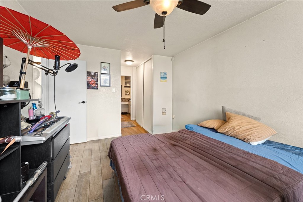 6979 Palm Court Riverside, CA 92506 - Photo 13 of 28 a bedroom with a bed and a closet